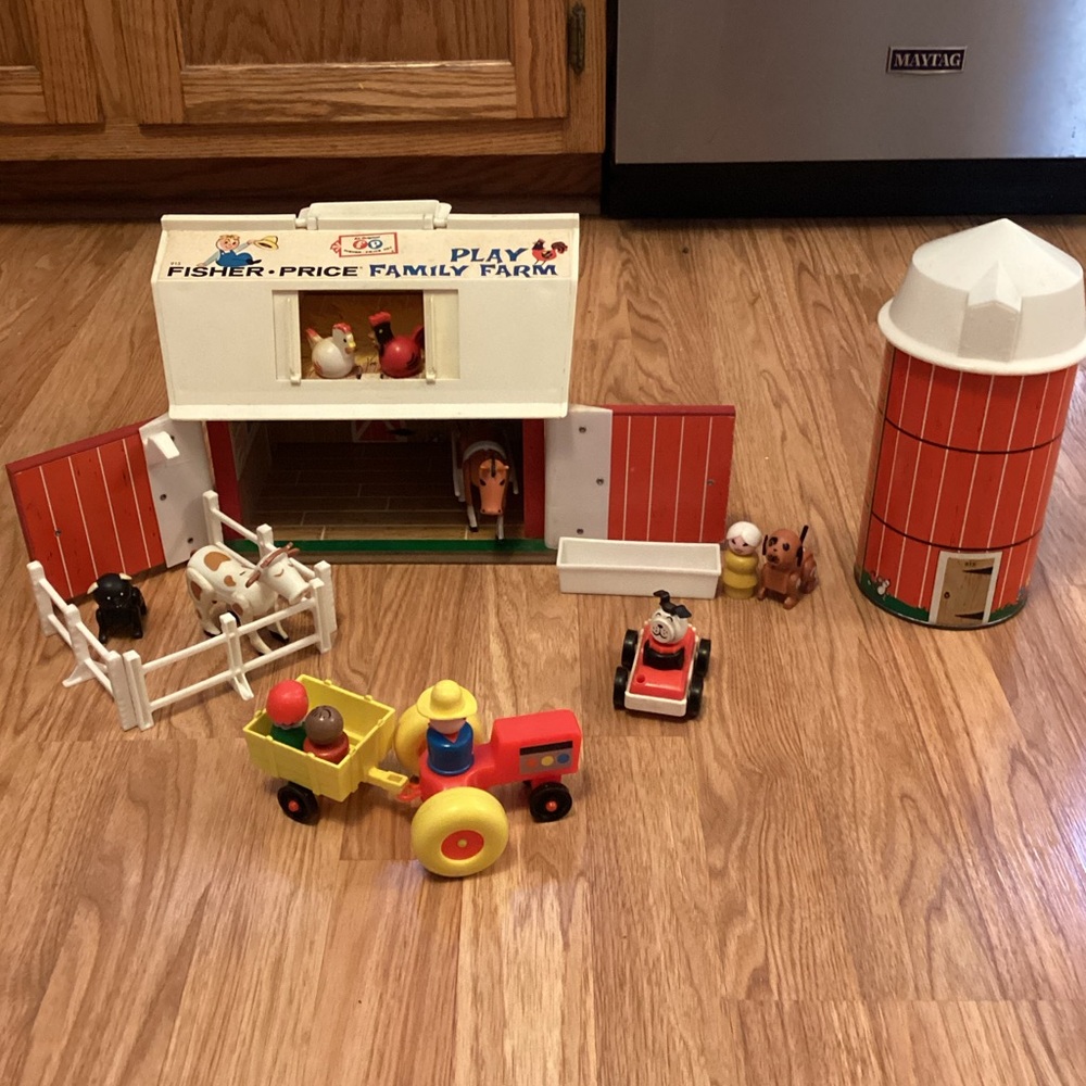 Fisher-Price Vintage Family Farm Play-set with Red Barn and Yellow Tractor.